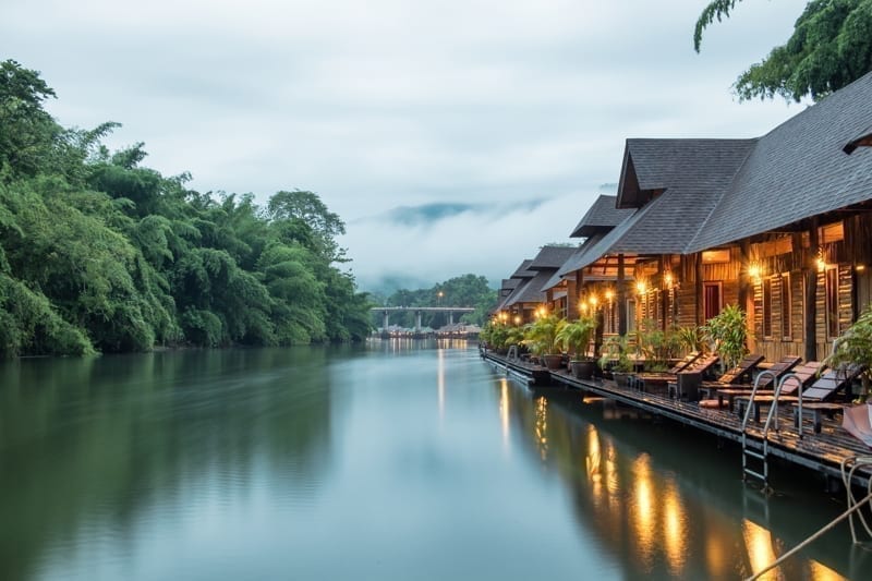 Resort wooden house floating and mountain fog on river Kwai At Sai Yok, Kanchanaburi, Thailand