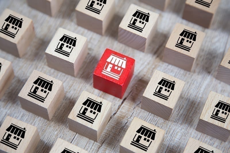 Wooden cube Stacked with Franchise business marketing icons 