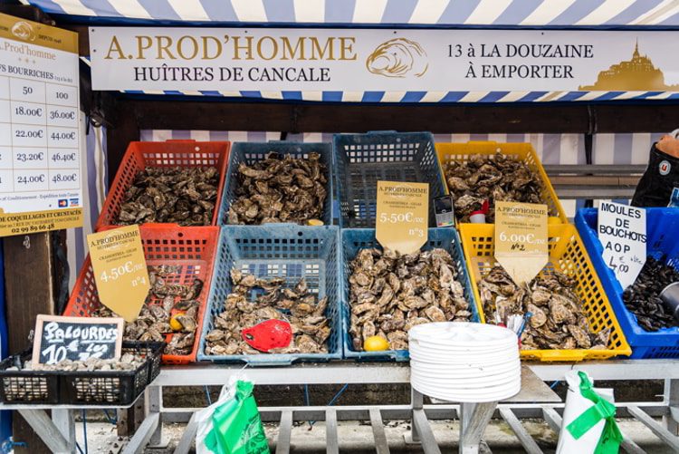 Crates with fresh oysters for sale in Cancale