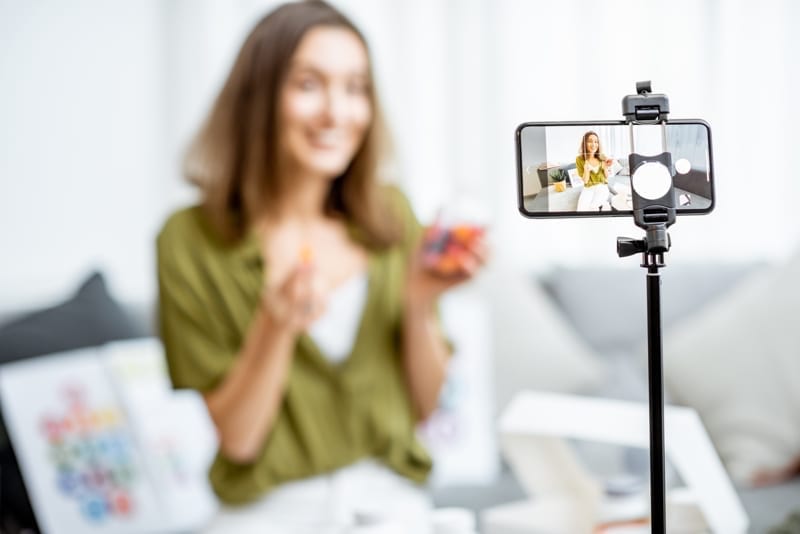 Woman recording her vlog 