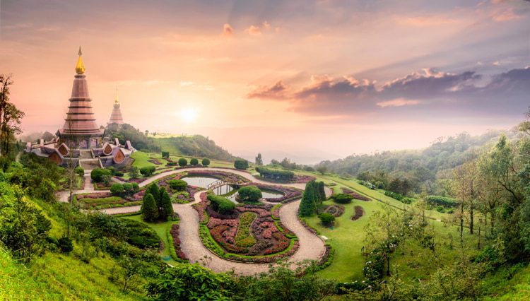 Landmark Pagoda in Doi Inthanon National Park with mist fog during sunset time in Chiang mai, Thailand.