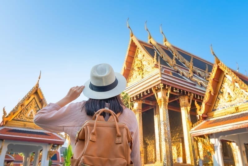 Tourist woman enjoy travel on Vacation in Bangkok at Thailand