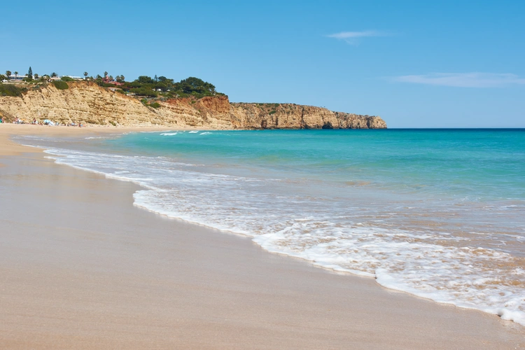 Praia do Porto de Mos, Lagos. Typical Algarvian beach with turquoise water and white sand