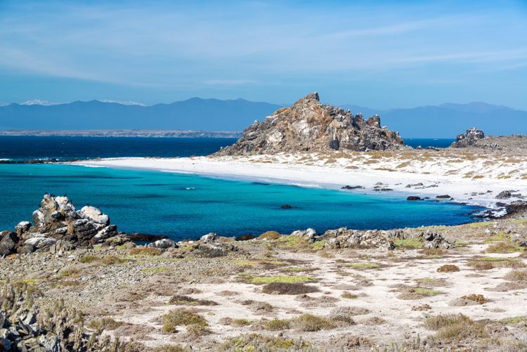 White sand beach and turquoise water at Damas Island near La Serena, Chile