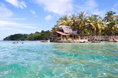 A blue sky and turquoise waters in Isla Mamey, Panama