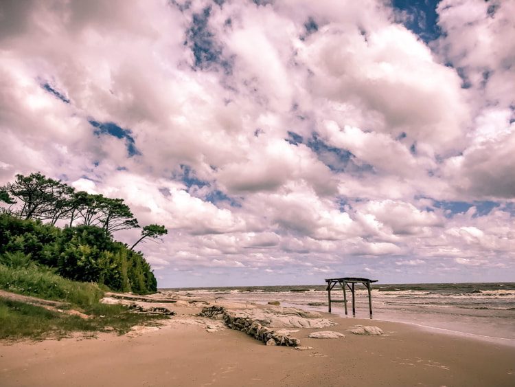 Scenic View Of Beach Against Sky in Atlántida, Uruguay