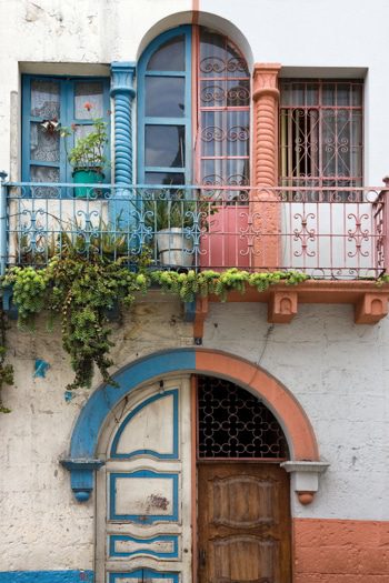 Old balcony on a house in Cuenca Southern Ecuador