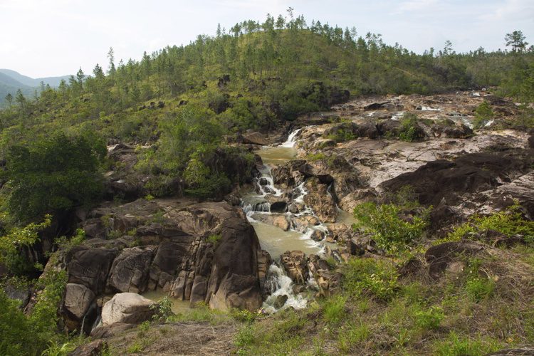 Beautiful green scenery with a waterfall in Cayo, Belize