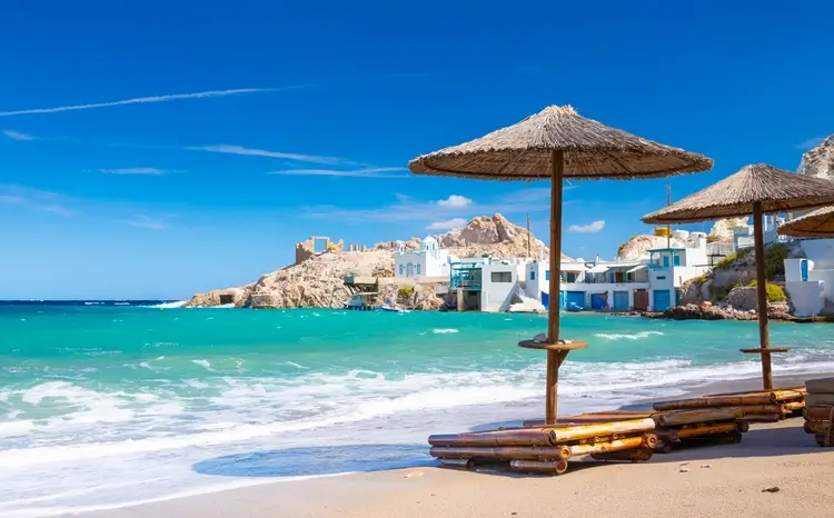 Beach and fishing village of Firapotamos on Milos island, Greece 