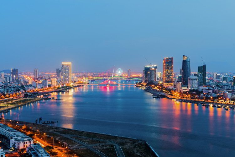 Da Nang city skyline cityscape at Han river at twilight in Da Nang, central Vietnam