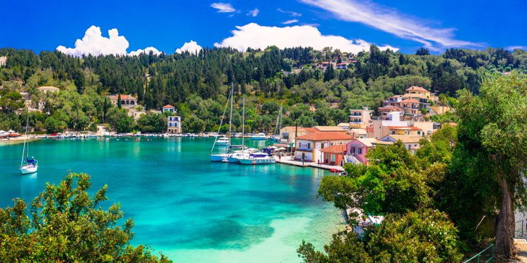 Picturesque fishing village Lakka in Paxos with turquoise sea, Ionian islands of Greece