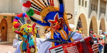 The Christmas parade Pase del Nino (Traveling Child) at historic center of city Cuenca