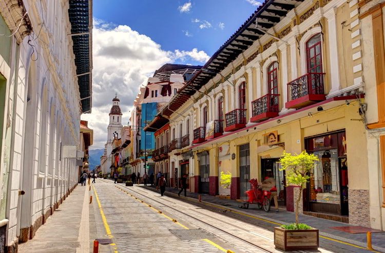 Colonial buildings with red balconies in Cuenca, Ecuador