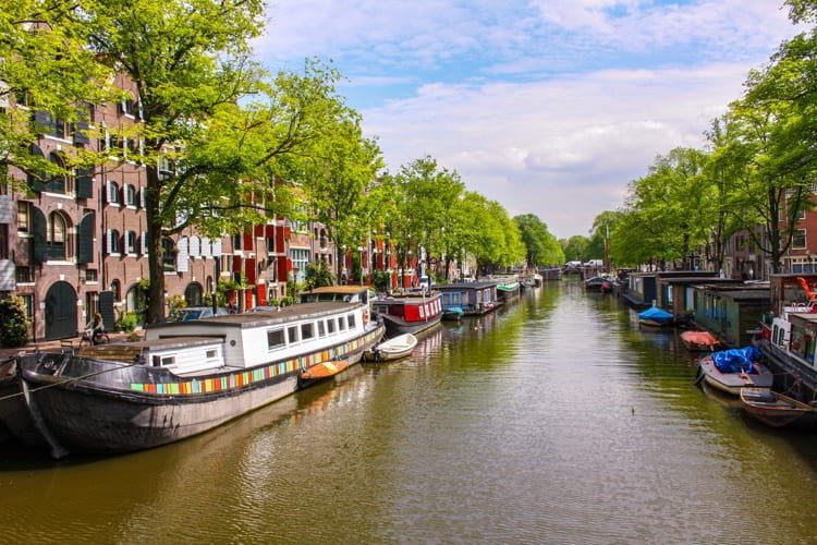 Canal in Amsterdam with houseboats