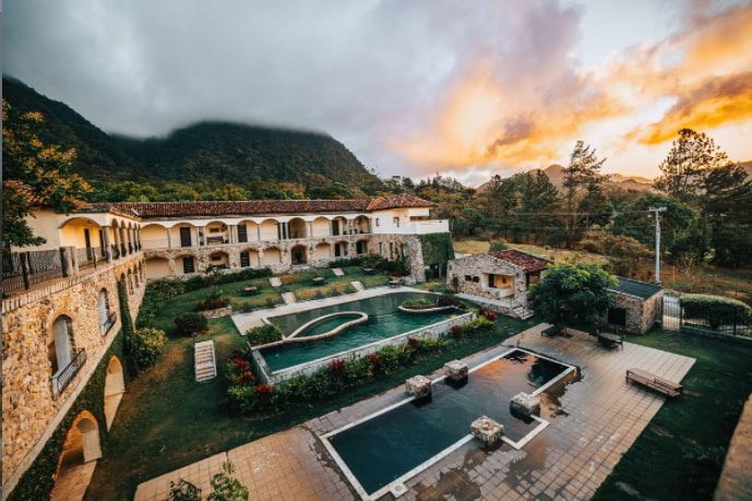 Los Mandarinos hotel in El Valle, Panama with pools during a cloudy sunset