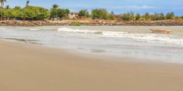 Small fisherman boats at the bay and the houses in El Rompio village near town of Chitre in Panama