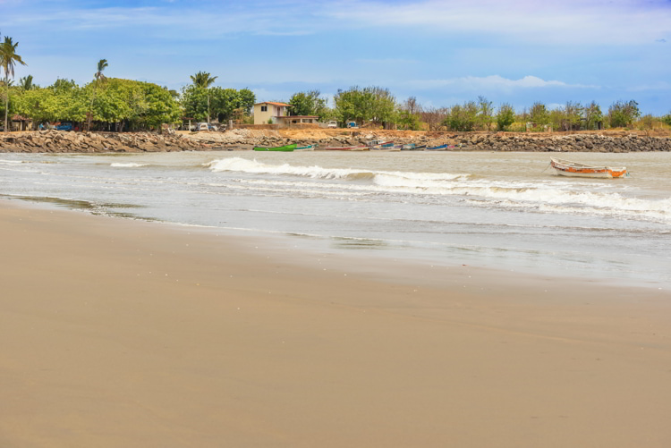 Small fisherman boats at the bay and the houses in El Rompio village near town of Chitre in Panama