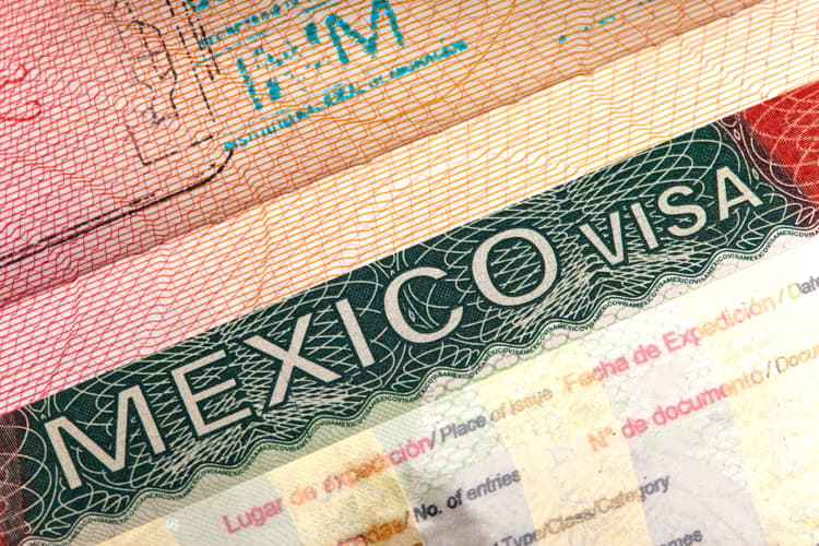 Close up of a visa of Mexico in a passport. huatulco