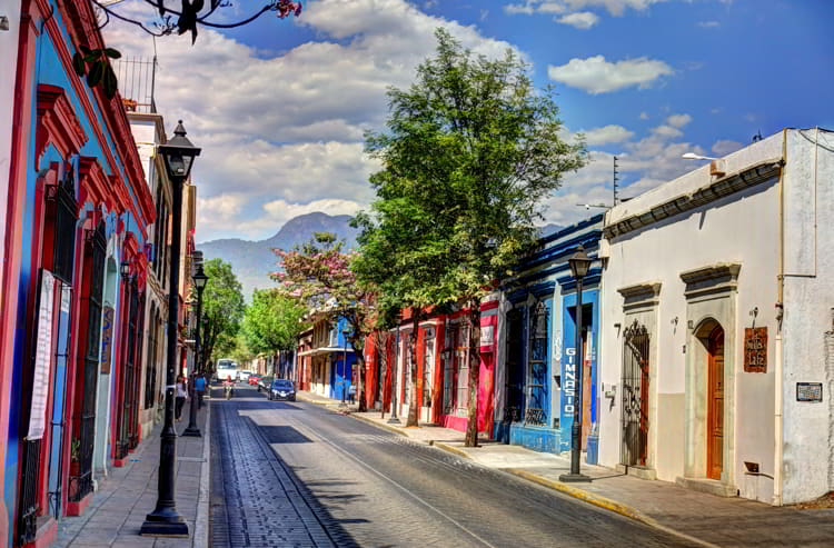 Colorful Colonial buildings on a sunny day in Oaxaca, Mexico