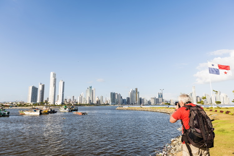 Senior man photographing a Panorama of Panama City.