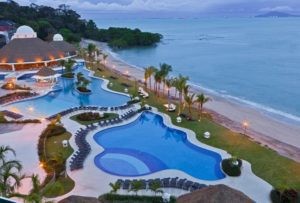 A beach resort in Panama with big pools and palm trees