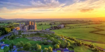 group of Medieval buildings set on limestone.