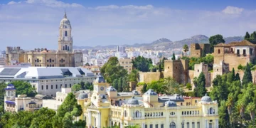 Malaga Spain Cityscape On The Sea. travel europe on a budget
