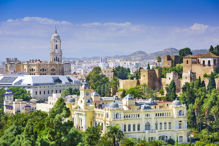 Malaga Spain Cityscape On The Sea. travel europe on a budget