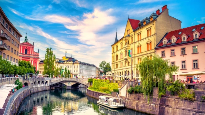 Cityscape view on Ljubljanica river canal in Ljubljana old town. Ljubljana is the capital of Slovenia and famous european tourist destination. retire in europe