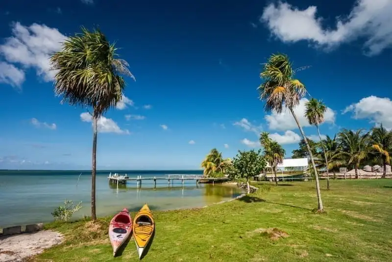 Kayaks at Corozal Bay seashore, Corozal District, Belize.