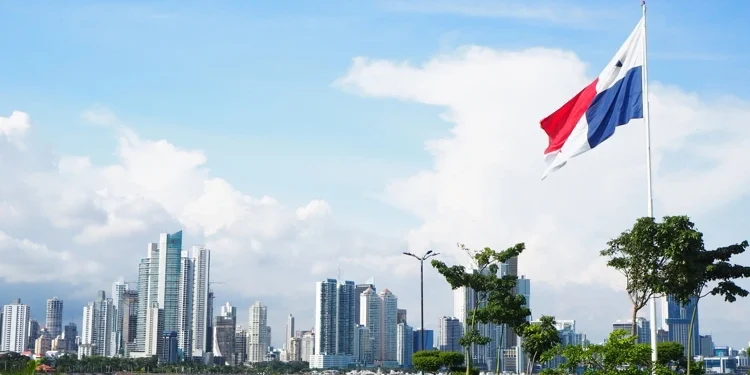 Skyline with green grass and flag in Panama