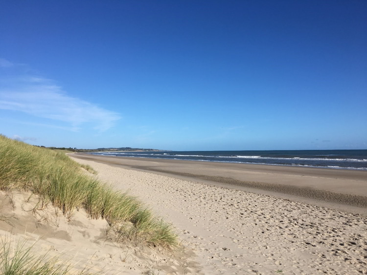 A white sand beach in the Copper Coast in Ireland