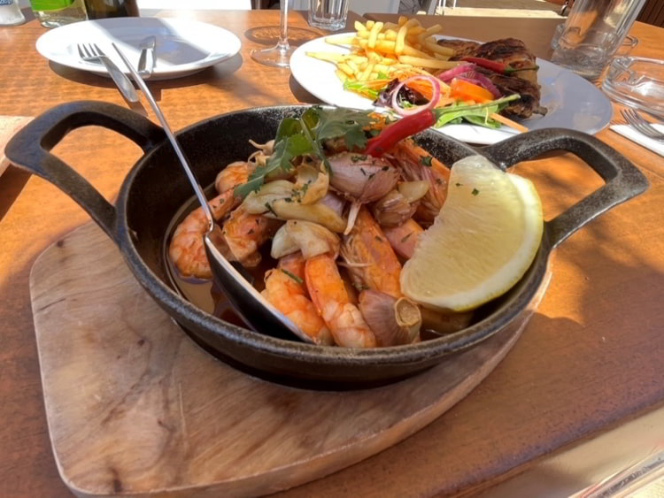 Freshly sautéedgarlic prawns