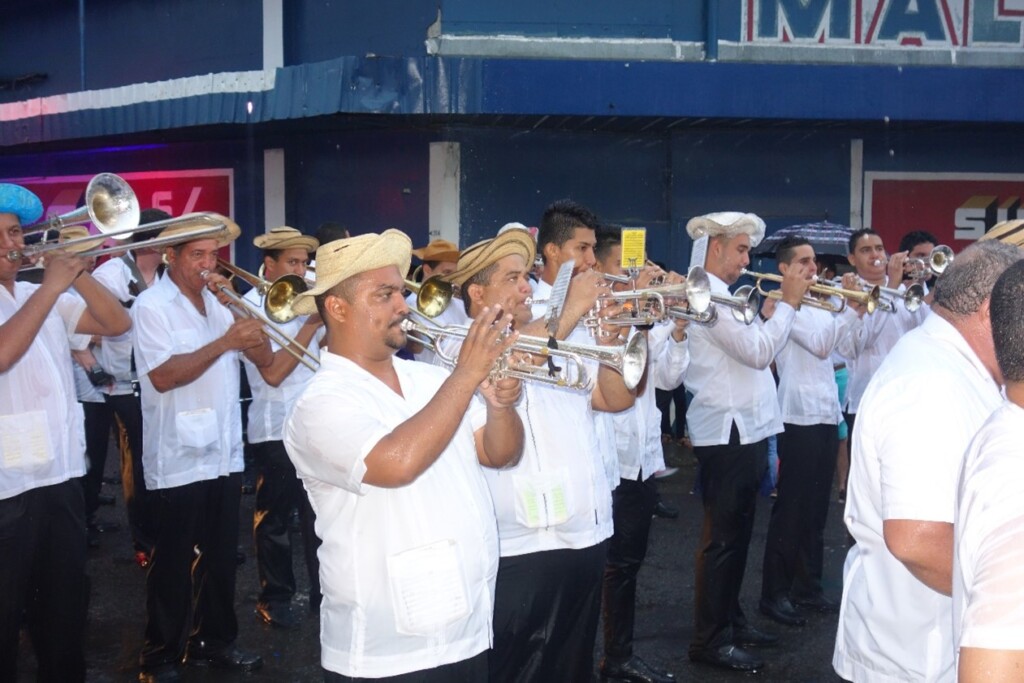 Panamanian Montuno playing trumpets in the street