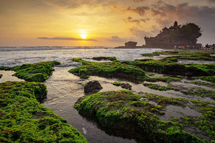 Sunset Over Tanah Lot temple In Canggu, Bali, Indonesia.