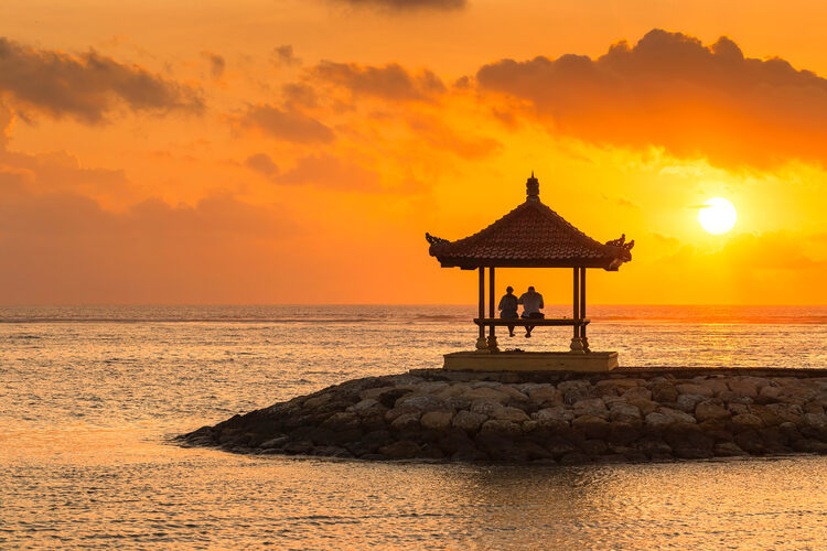Sunset at Karang Beach, in Sanur, Bali, Indonesia.