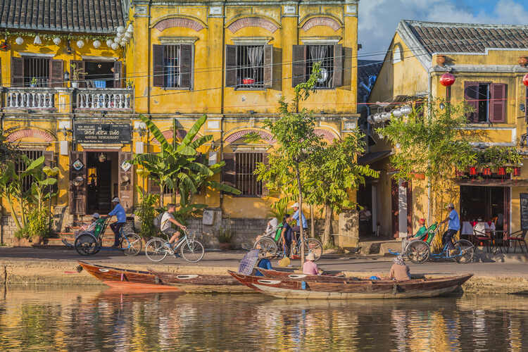Boats and old town in Hoi An, Vietnam.