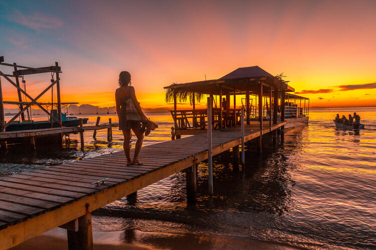sunset on a pier, on Roatan Island. Honduras
