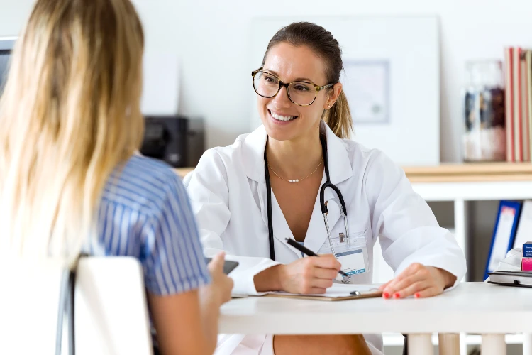Female doctor explaining diagnosis to her patient. health care in Famagusta