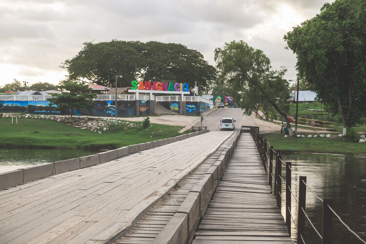 Wooden bridge crossing Macal River, in San Ignacio, Belize.