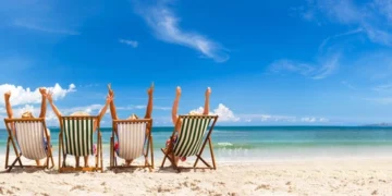 Cheerful Friends In A Beach