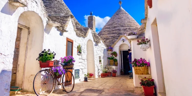 Alberobello, Puglia, Italy: Typical houses built with dry stone walls and conical roofs