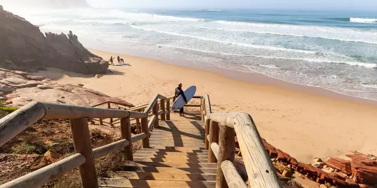 wooden staircase to a beach in Portugal