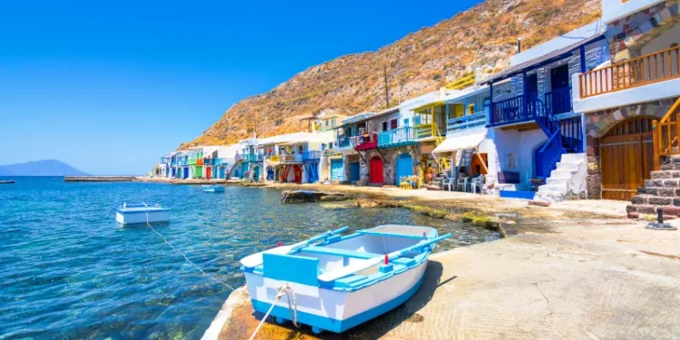 Scenic Klima village (traditional Greek village by the sea, the Cycladic-style) with sirmata - traditional fishermen's houses, Milos island, Cyclades, Greece.