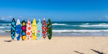 Colorful surfboards displayed on My Khe Beach located in Da Nang, central Vietnam. beach cities