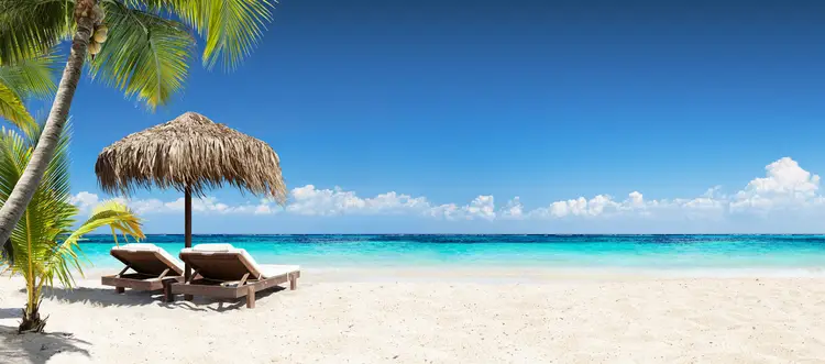 Seascape view with chairs and umbrella