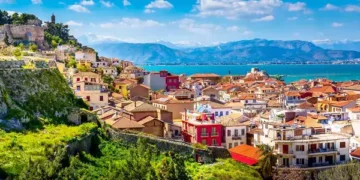 Nafplio, Greece aerial view and snow mountains.