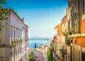 Street in old town in Lisbon, Portugal. Things Expats Wish They Knew
