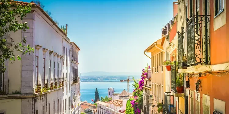 Street in old town in Lisbon, Portugal. Things Expats Wish They Knew