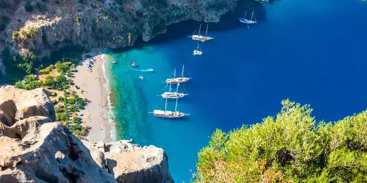 Butterfly Valley (Turkish: Kelebekler Vadisi) is a valley in Fethiye district, Mugla Province, on the Mediterranean coast of Turkey. second honeymoon